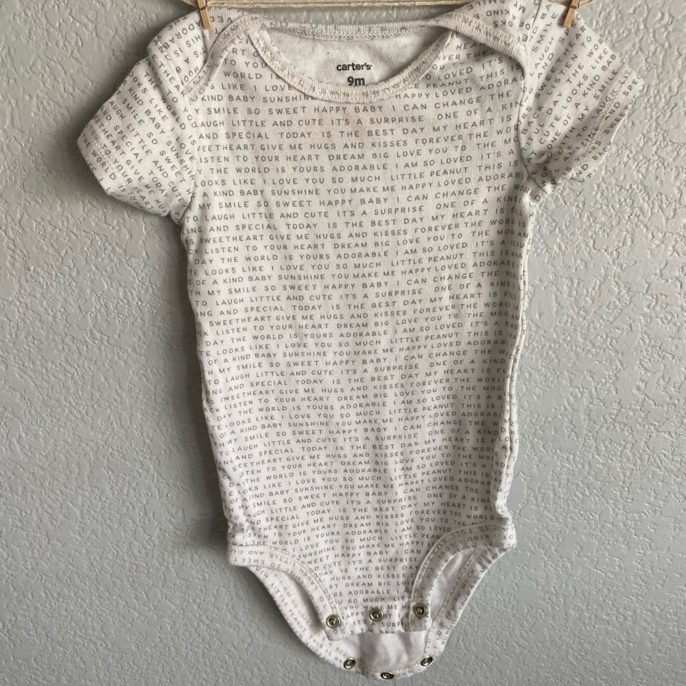 White onesie with gray lettering